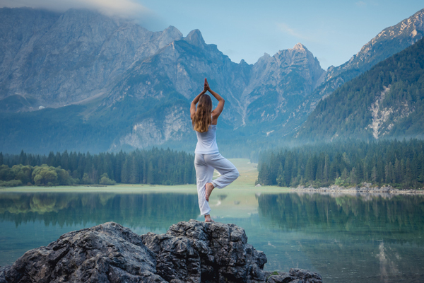yoga woman in mountains